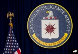 FILE - The seal of the Central Intelligence Agency is seen at CIA headquarters in Langley, Va.