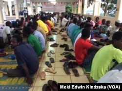 FILE - Christians breaking fast wtih Muslims at a mosque in Yaounde.