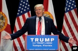 FILE - Republican presidential candidate Donald Trump has largely self-financed his campaign but seeks big donations for the general election.