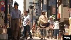 A street scene in Tokyo. Japan is averse to mass immigration – a solution other countries have used to compensate for a declining population.