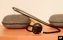 FILE - Google Pixel Buds on display at a Google event in San Francisco, Oct. 4, 2017.