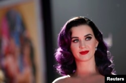 Cast member and singer Katy Perry poses at the premiere of "Katy Perry: Part of Me" at the Grauman's Chinese theatre in Hollywood, California June 26, 2012.