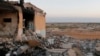 A general view shows a damaged school that was targeted on Monday by what activists said were U.S.-led air strikes, at Ain al-Arous town in Raqqa governorate, October 1, 2014.
