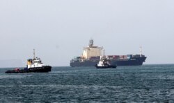 FILE - Ships are seen in the Gulf of Oman, Feb. 25, 2019.