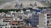 Japan PM Suspends Relocation of Okinawa Marine Base