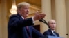 FILE - U.S. President Donald Trump gestures as Russian President Vladimir Putin looks on in Helsinki, Finland, July 16, 2018.