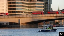 Kogin Thames da ya ratsa ta birnin London (AP Photo/Frank Augstein)