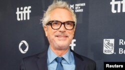 FILE - Director Alfonso Cuaron poses on the red carpet before "Disclaimer" is screened at the Toronto International Film Festival, Sept. 9, 2024.