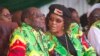 Zimbabwean President Robert Mugabe and his wife Grace follow proceedings during a youth rally in Marondera about 100 kilometers east of Harare, June, 2, 2017. 