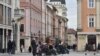 People are seen on a street in central Lviv, Ukraine, Feb. 15, 2022.