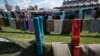 Kosovo Art Installation of Dresses Supports War Rape Victims