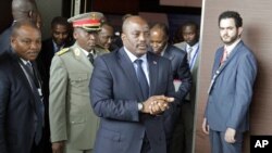 FILE - Democratic Republic of the Congo President Joseph Kabila arrives for a southern and central African leaders' meeting to discuss the political crisis his country, in Luanda, Angola, Oct. 26, 2016.