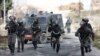 Polisi perbatasan Israel saar bentrokan dengan para pengunjuk rasa Palestina di Ramallah, Tepi Barat,1 Februari 2020. (Foto: dok). 