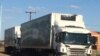 Trucks carry goods into Botswana after being cleared at the Tlokweng border post. (Mqondisi Dube/VOA)