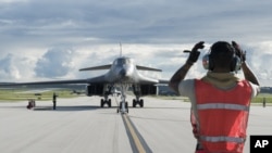 FILE - A B-1B Lancer arrives at Andersen Air Force Base, Guam, July 26, 2017, in this photo provided by the U.S.Air Force.