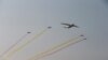 Des avions militaire survolent la capitale de la Birmanie, Naypyitaw, le 27 mars 2017.