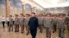 North Korean leader Kim Jong Un (C) visits the Kumsusan Palace of the Sun at midnight on Tuesday on the occasion of the 20th anniversary of the demise of President Kim Il Sung in this photo released by North Korea's Korean Central News Agency (KCNA) July 8, 2014.